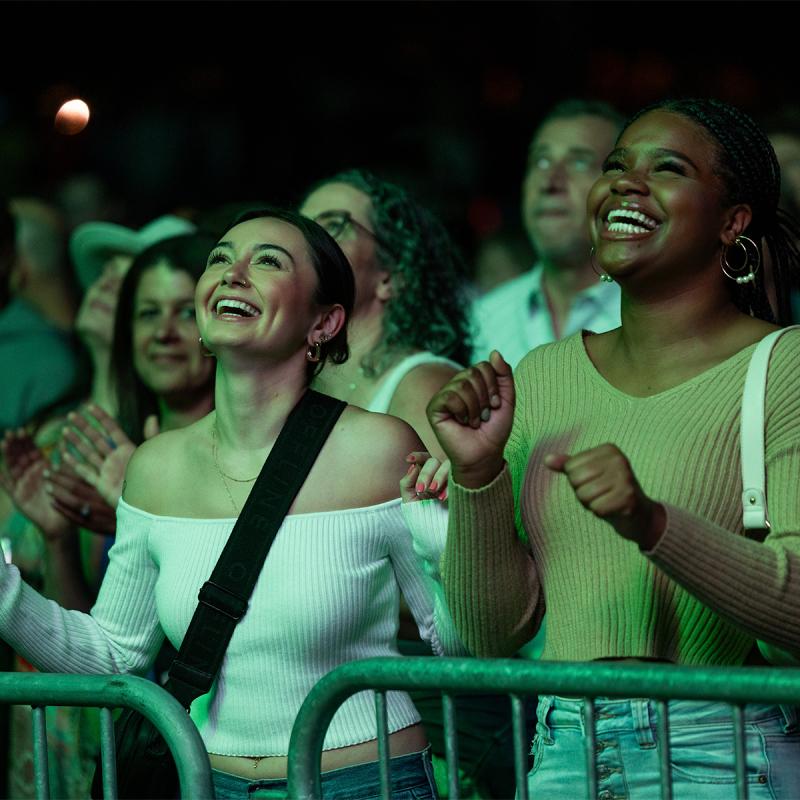 2 students enjoying a concert at the green music center