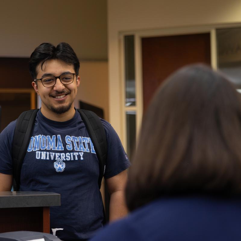 students meeting counselor