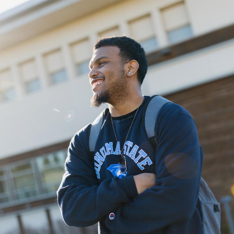 Student at the GMC smiling after being tranfered to SSU