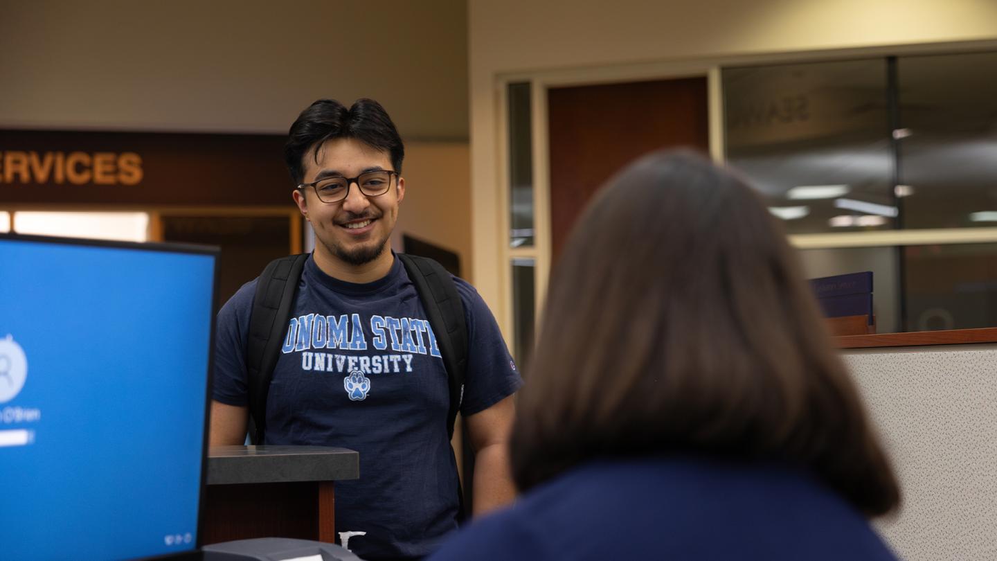 students meeting counselor