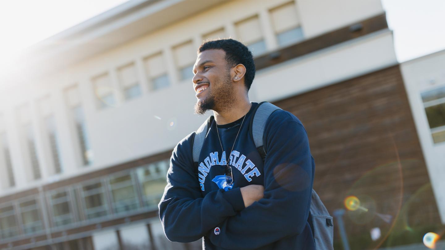 Student at the GMC smiling after being tranfered to SSU