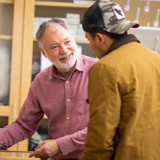 professor teaching an SSU student