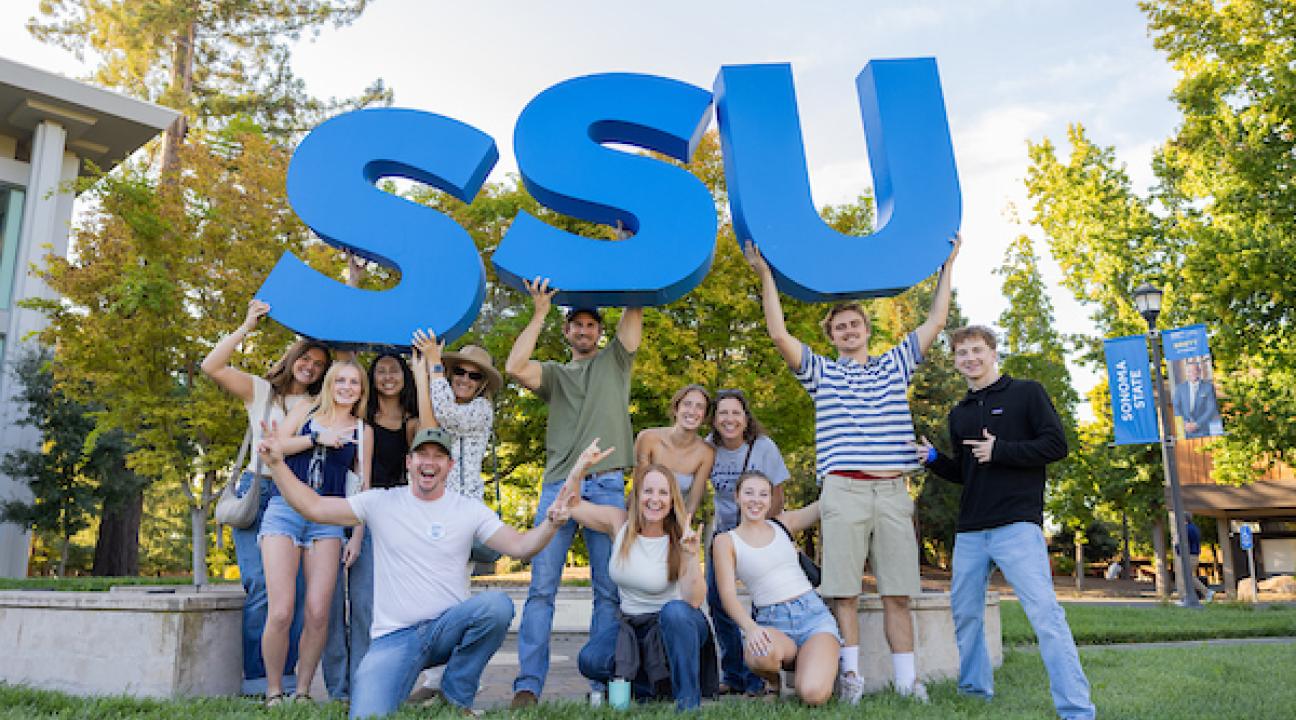Group of students holding up SSU large letters