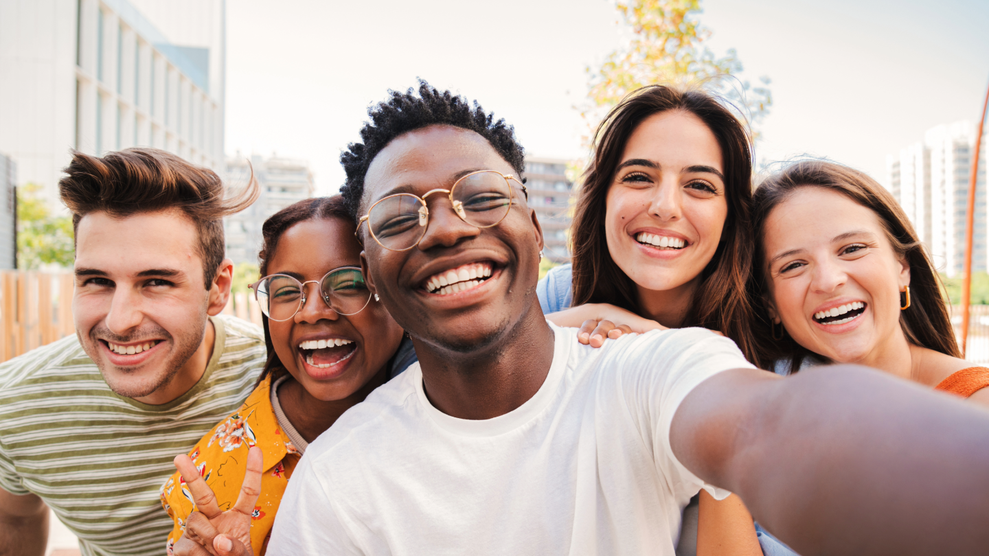 Group of people taking selfie